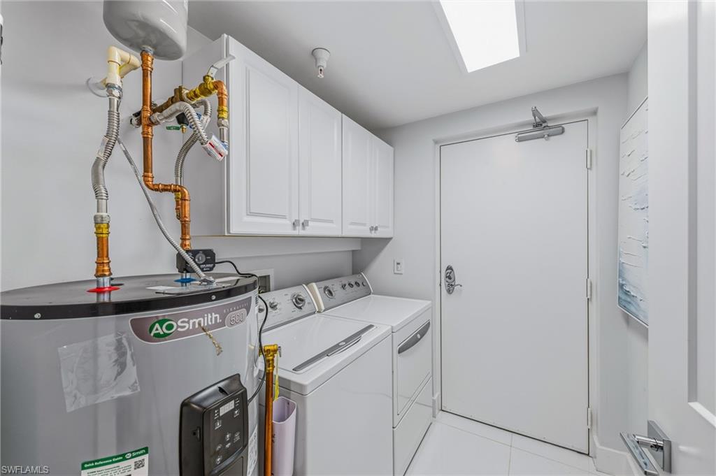 1065 Borghese Lane, Unit 1503 Naples, FL 34114 - Photo 26 of 32 Laundry Room