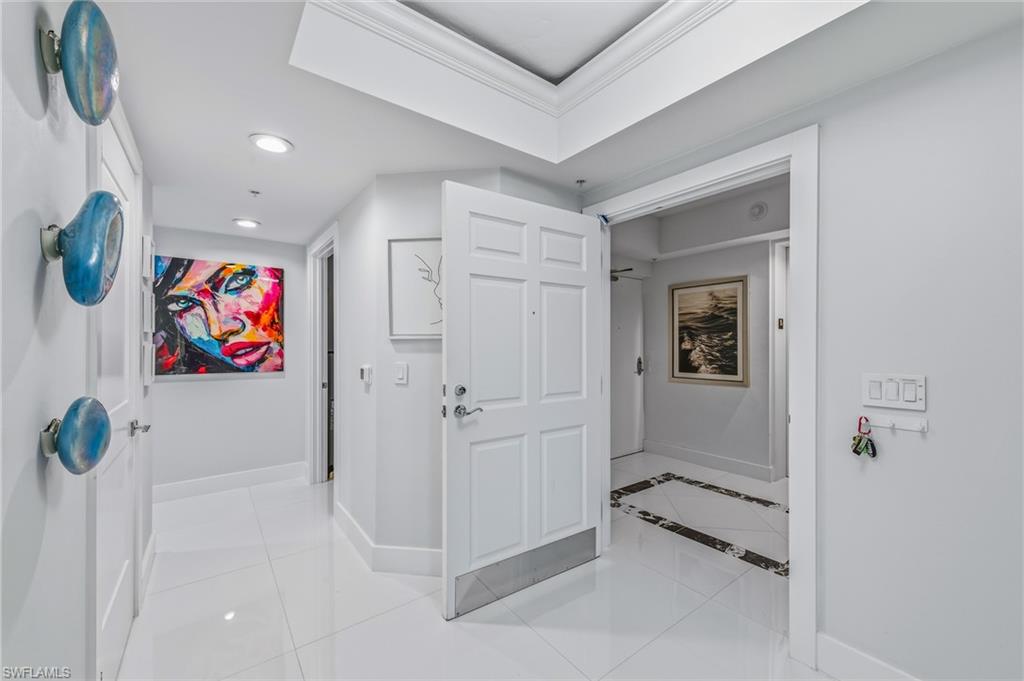 1065 Borghese Lane, Unit 1503 Naples, FL 34114 - Photo 6 of 32 Foyer/Private Elevator Entrance