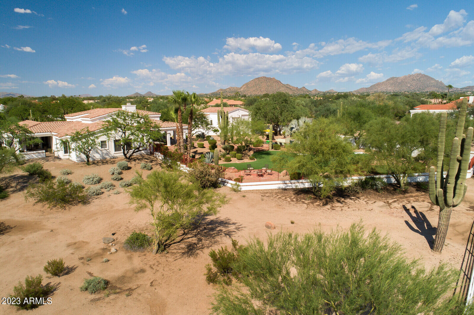 8161 East Alameda Road Scottsdale, AZ 85255 - Photo 103 of 107 a view of a lake with mountains in the background