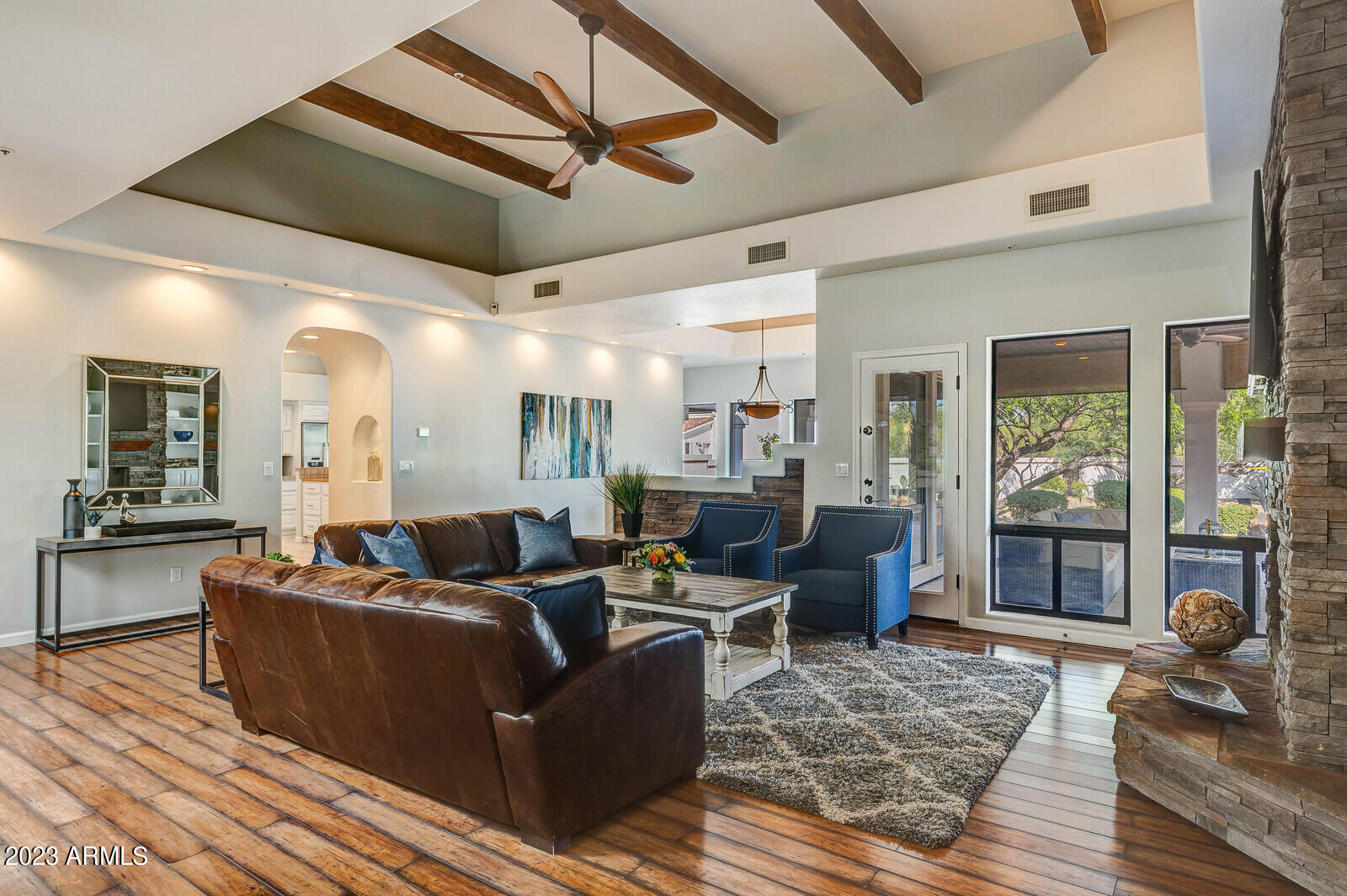 8161 East Alameda Road Scottsdale, AZ 85255 - Photo 12 of 107 a living room with furniture and a large window
