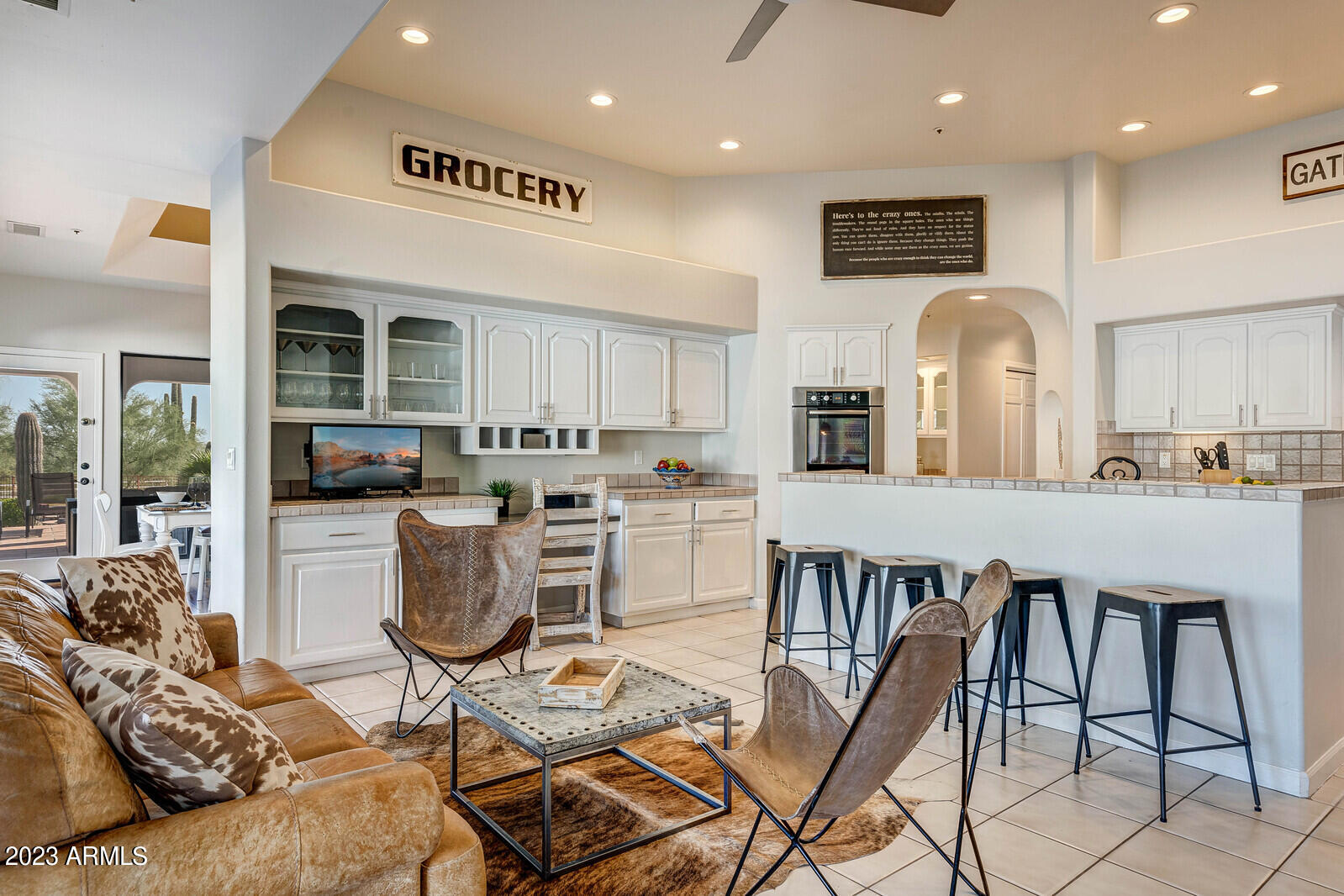 8161 East Alameda Road Scottsdale, AZ 85255 - Photo 19 of 107 a living room with furniture and a kitchen view