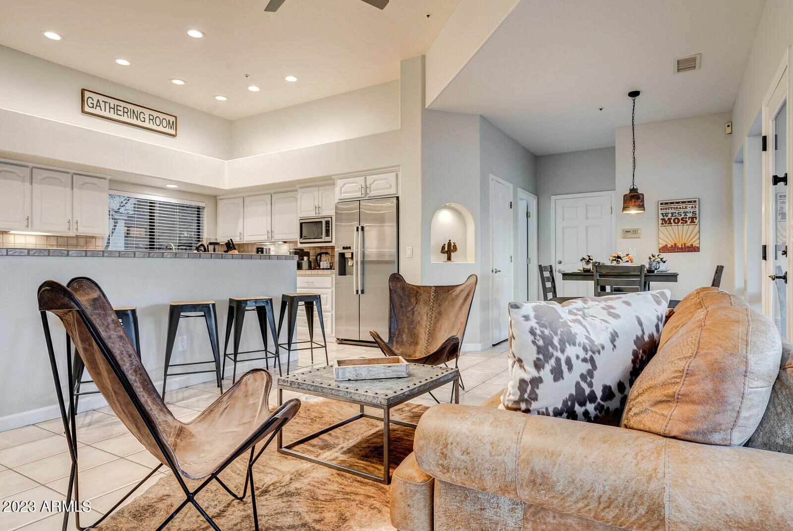 8161 East Alameda Road Scottsdale, AZ 85255 - Photo 24 of 107 a living room with furniture and kitchen view