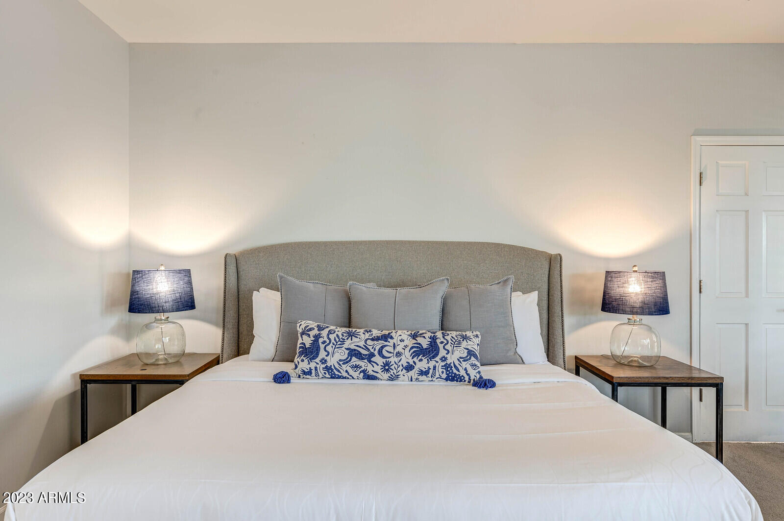 8161 East Alameda Road Scottsdale, AZ 85255 - Photo 30 of 107 a bedroom with a large bed and a lamp