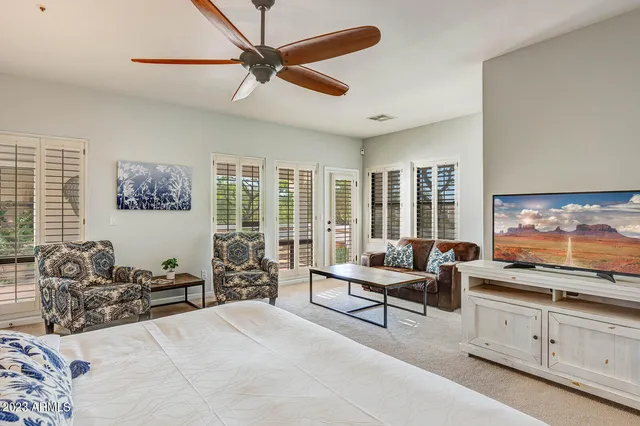 a view of a swimming pool with a patio