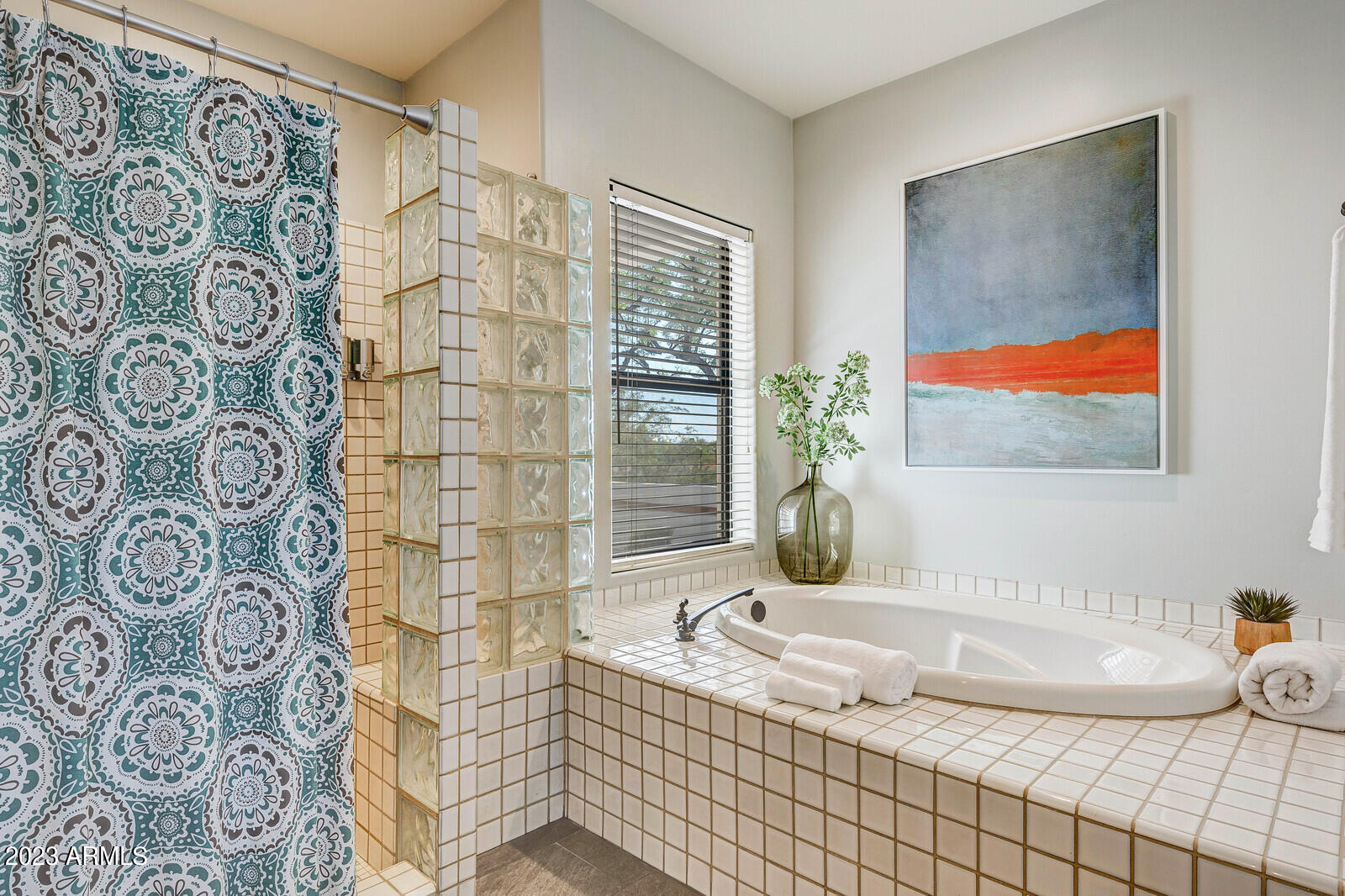 8161 East Alameda Road Scottsdale, AZ 85255 - Photo 36 of 107 a bathroom with a granite countertop sink and a bathtub