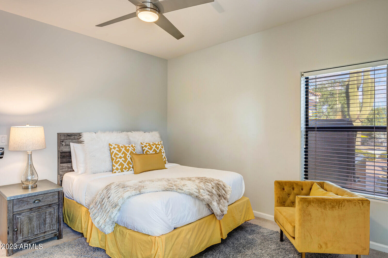 8161 East Alameda Road Scottsdale, AZ 85255 - Photo 48 of 107 a bedroom with a bed and a couch