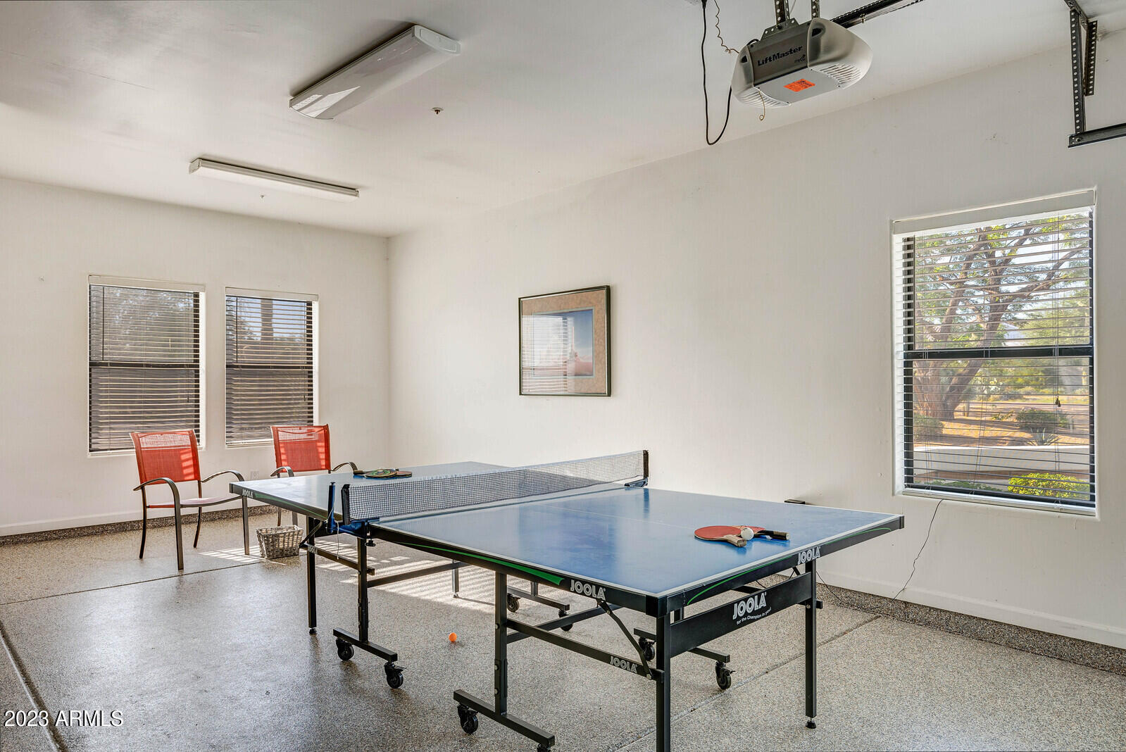 8161 East Alameda Road Scottsdale, AZ 85255 - Photo 50 of 107 a view of a workspace with furniture and a window