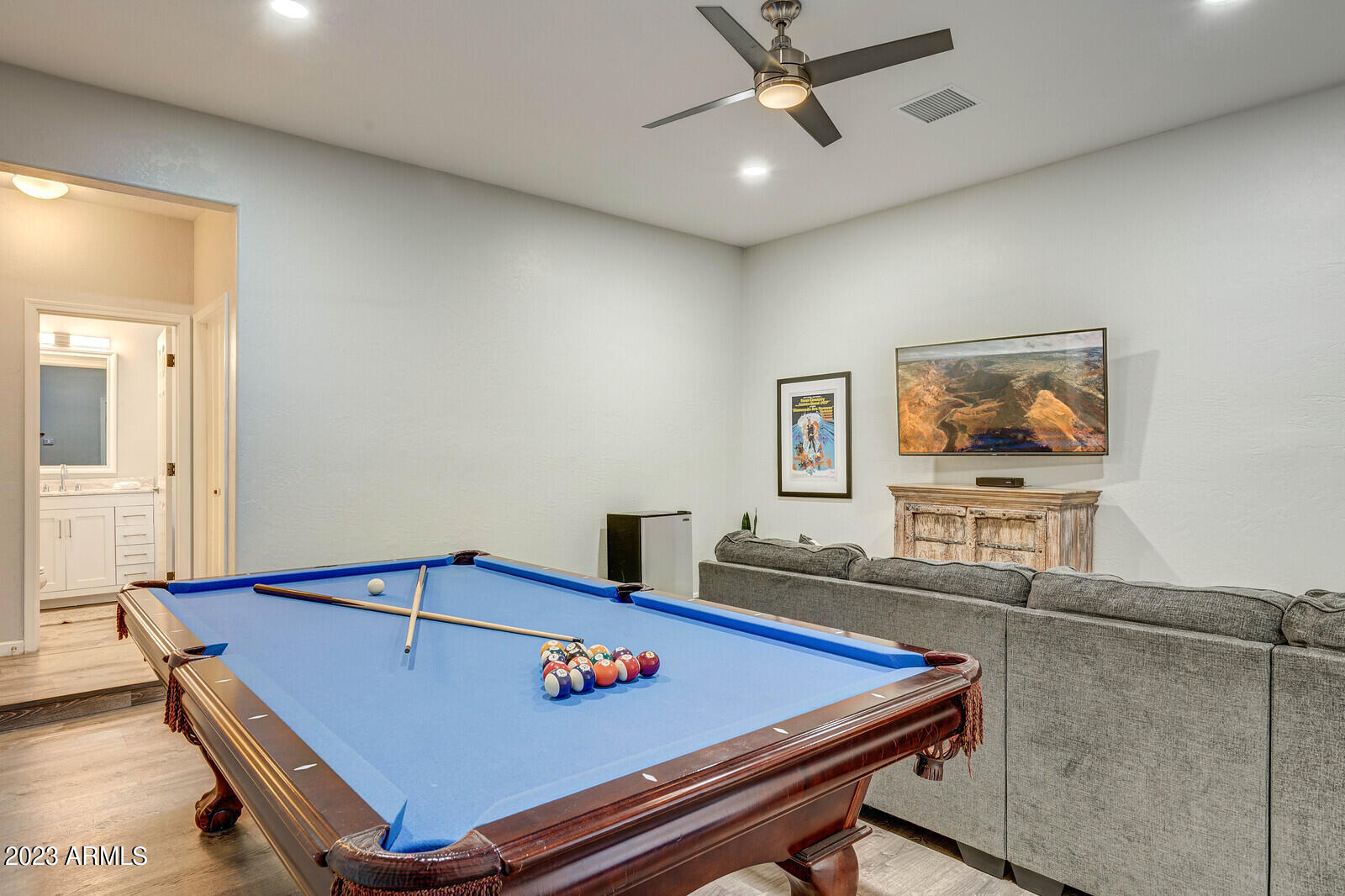 8161 East Alameda Road Scottsdale, AZ 85255 - Photo 51 of 107 a living room with furniture pool table and flat screen tv