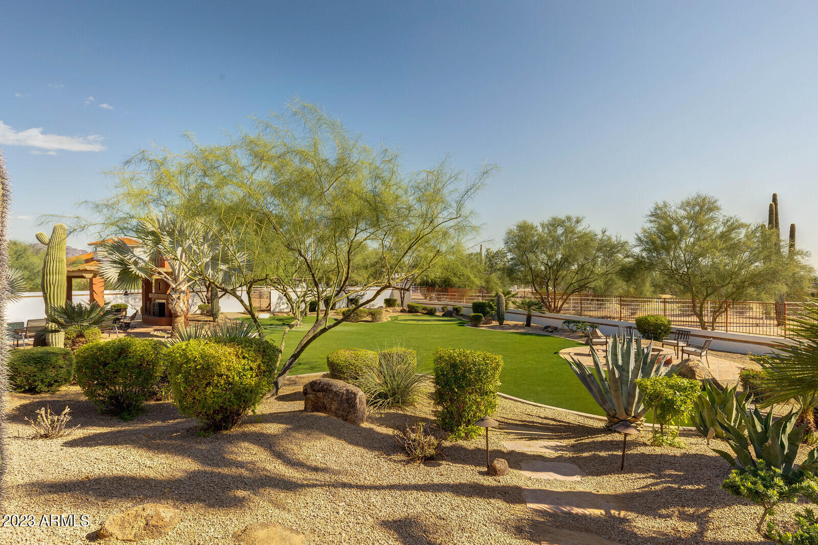 8161 East Alameda Road Scottsdale, AZ 85255 - Photo 67 of 107 a view of a swimming pool with a patio