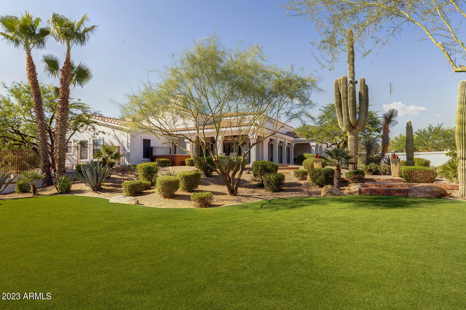8161 East Alameda Road Scottsdale, AZ 85255 - Photo 71 of 107 a front view of a building with garden