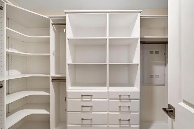 a view of an empty walk in closet