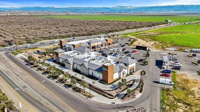 a view of a city with an ocean view