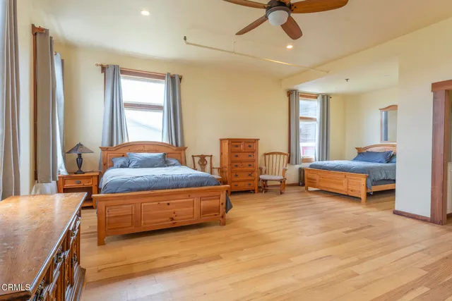 a bedroom with furniture and window