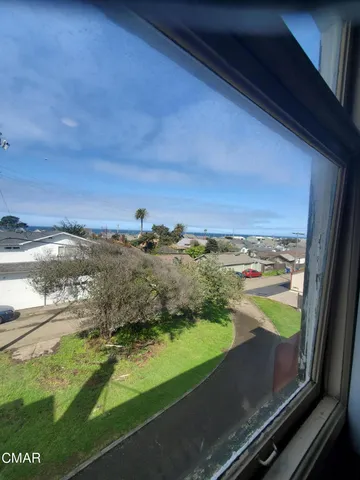 a bed room with a bed and a television