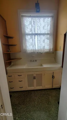 a view of a room with an empty space