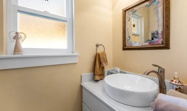a bathroom with a sink and a mirror