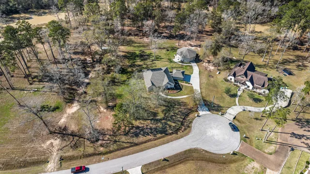 an aerial view of residential house with parking space