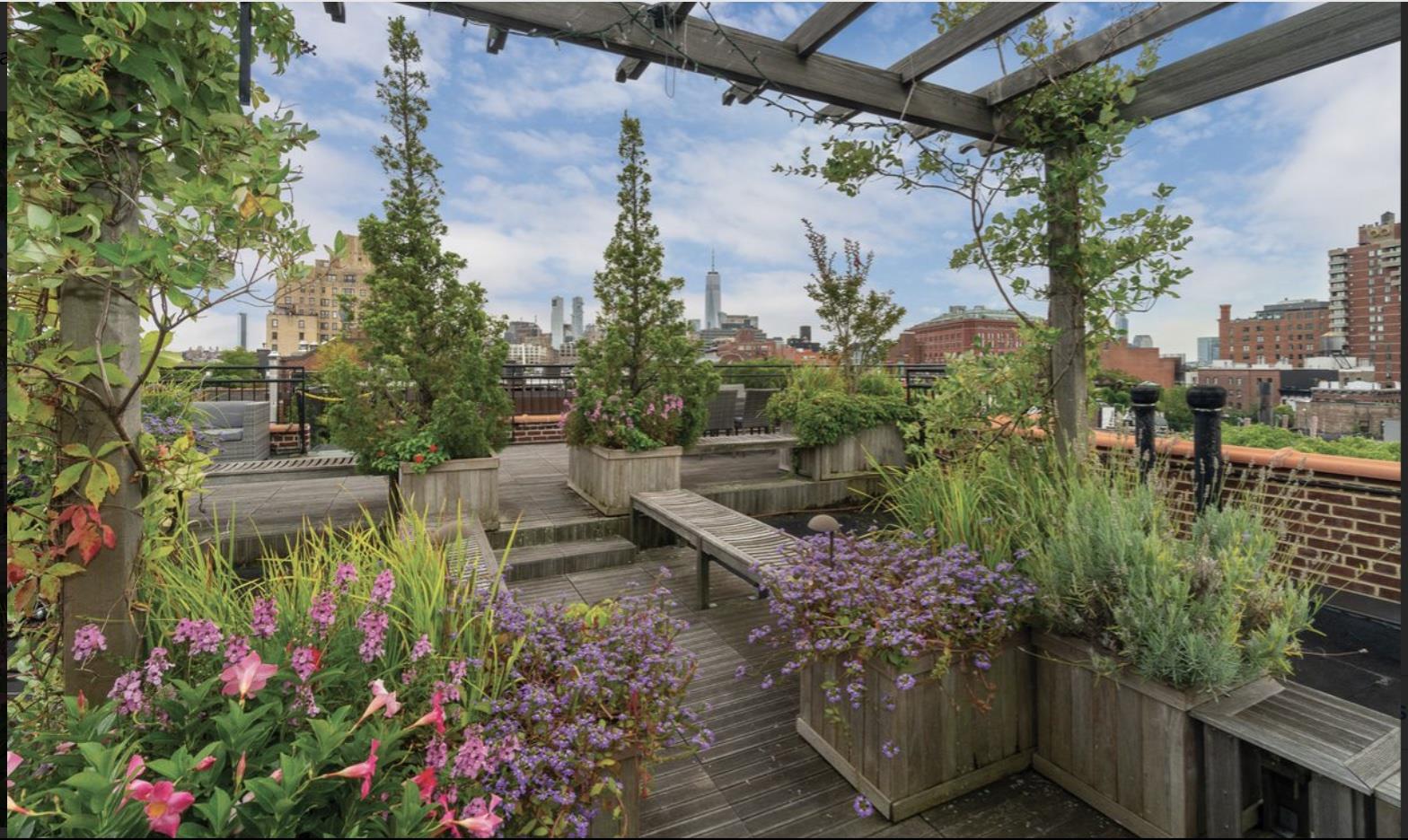 96 Perry Street, Unit B17B Manhattan, NY 10014 - Photo 4 of 8 a view of a backyard with sitting area