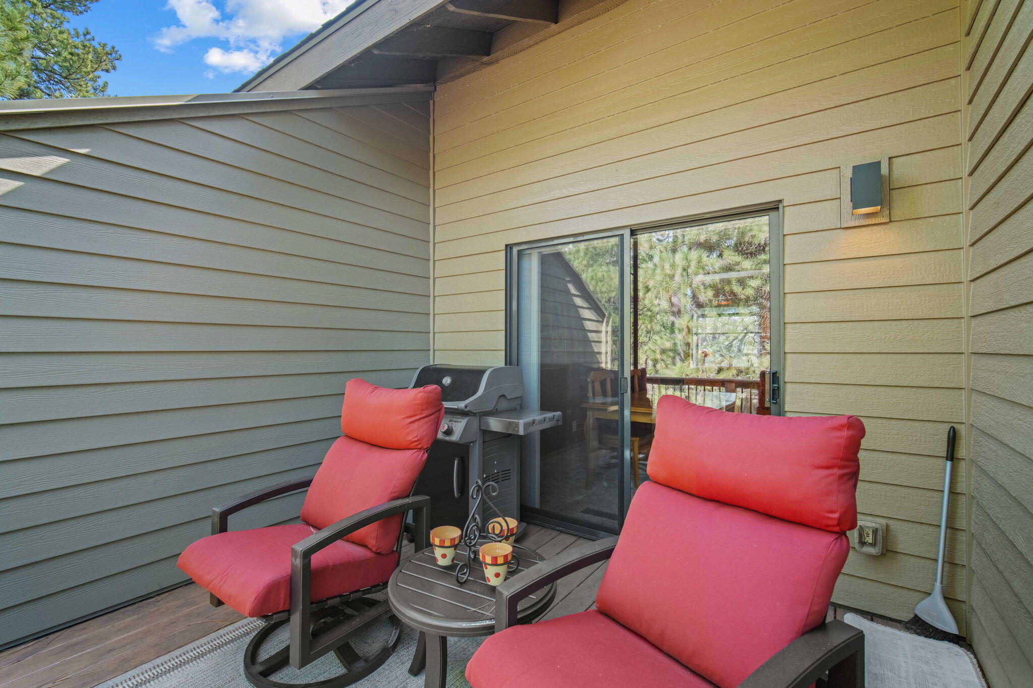 17682 Bittern Lane, Unit 31 Sunriver, OR 97707 - Photo 22 of 44 a outdoor sitting area with furniture and wooden floor