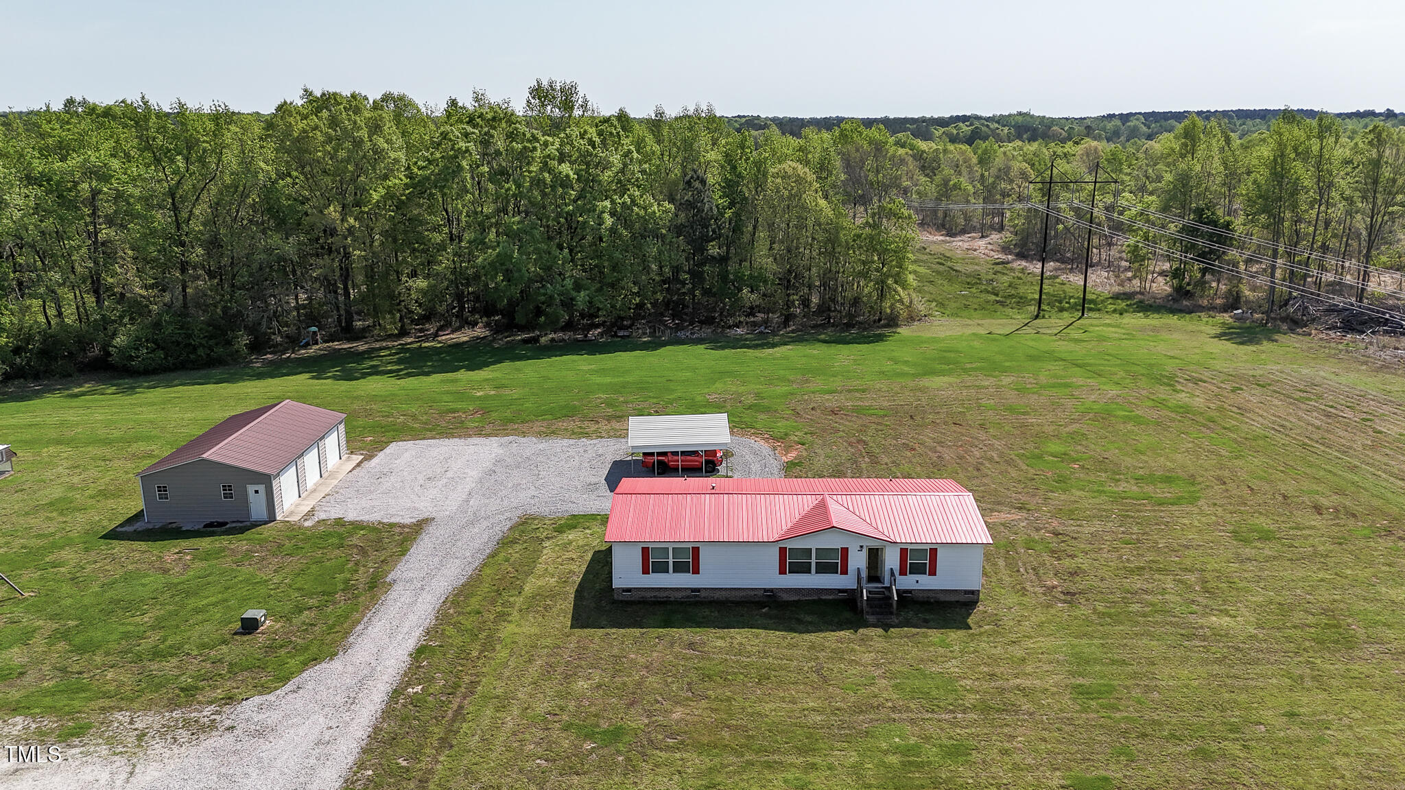 8091 Stone Heritage Road Bailey, NC 27807 - Photo 1 of 23 DJI_20250414105843_0055_D