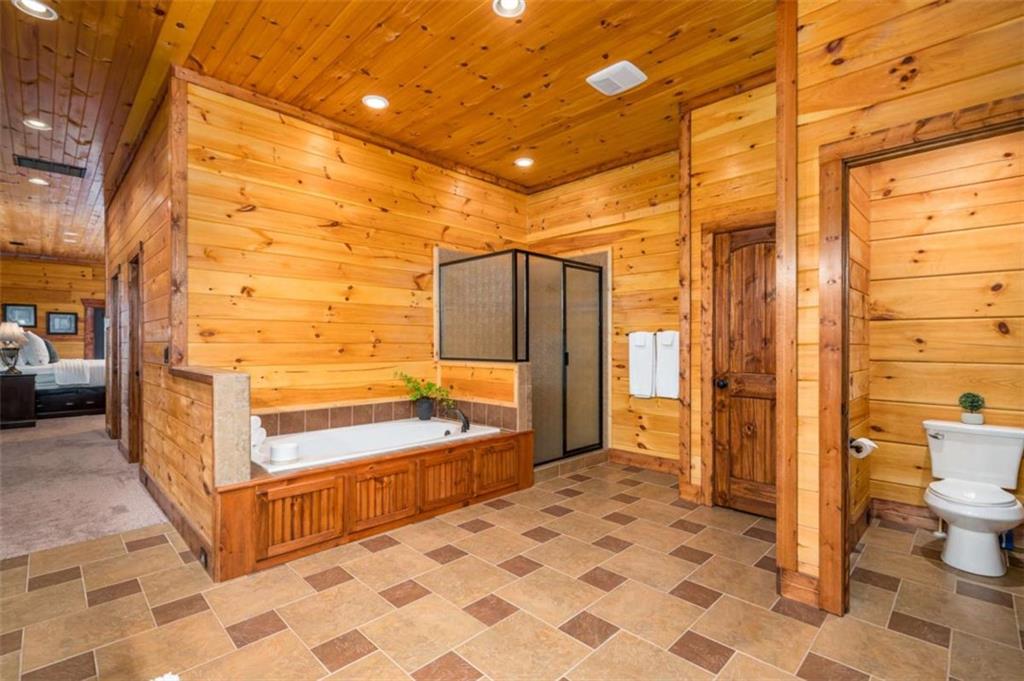 31 High Cliff Road Jasper, GA 30143 - Photo 19 of 23 a bathroom with a sink and a shower