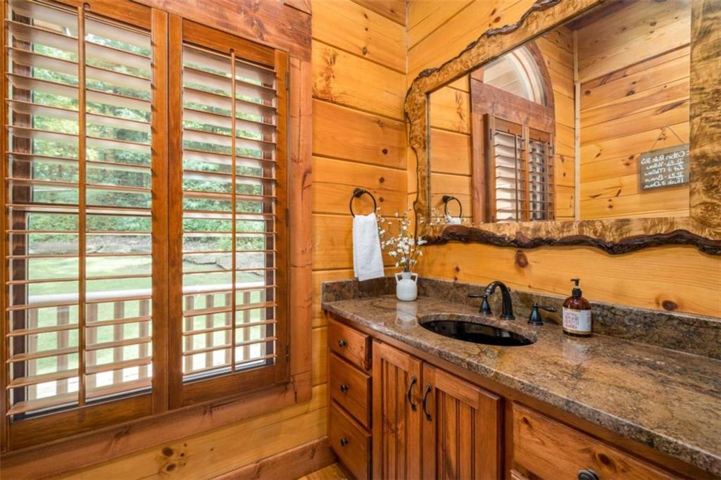31 High Cliff Road Jasper, GA 30143 - Photo 9 of 23 a kitchen with a sink and a window