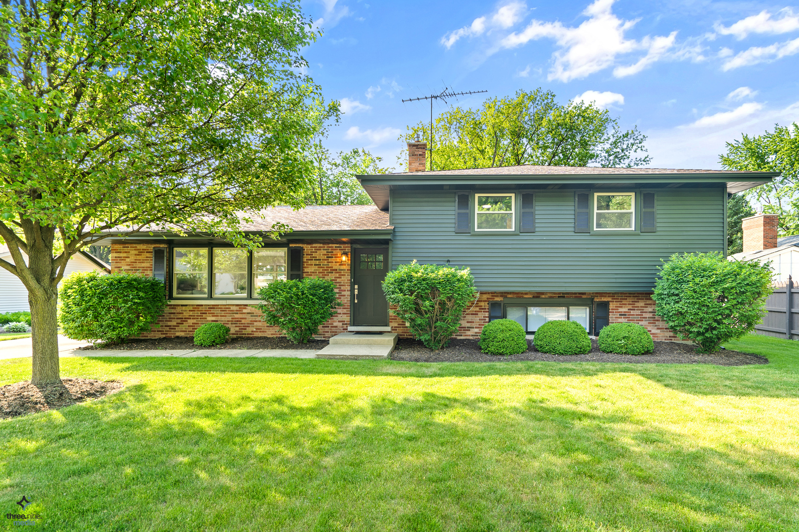 433 West Gartner Road Naperville, IL 60540 - Photo 1 of 29 a front view of a house with a yard