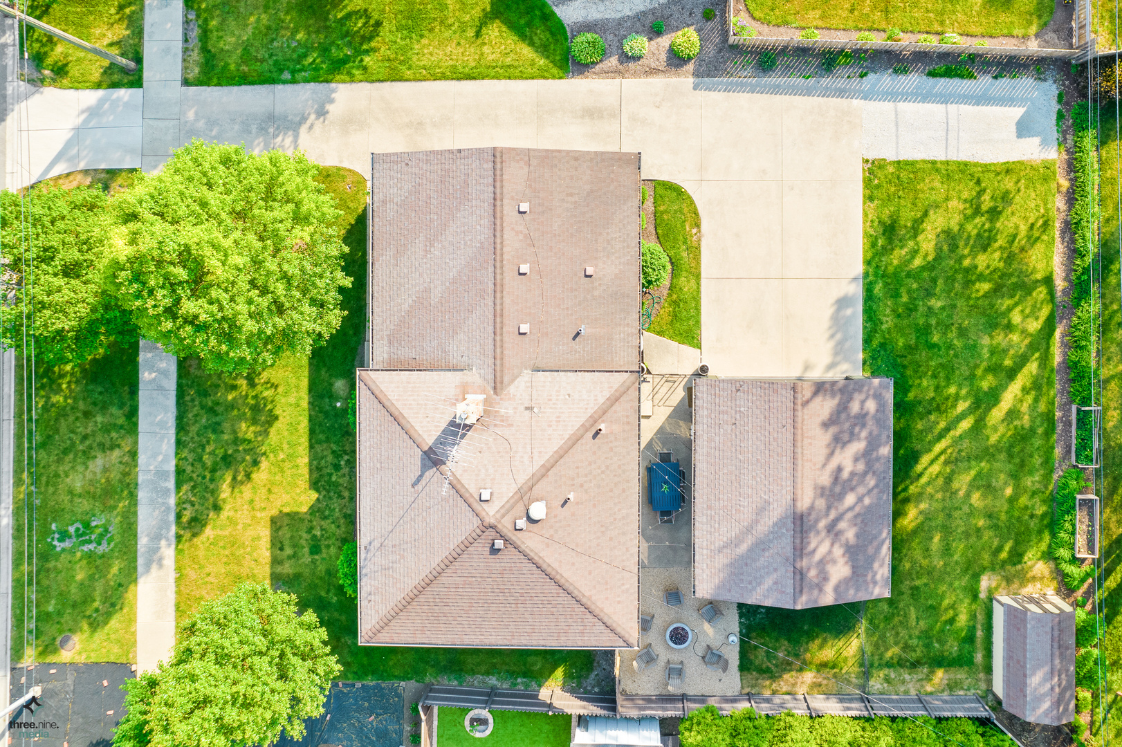 433 West Gartner Road Naperville, IL 60540 - Photo 25 of 29 an aerial view of a house with a yard and a car park