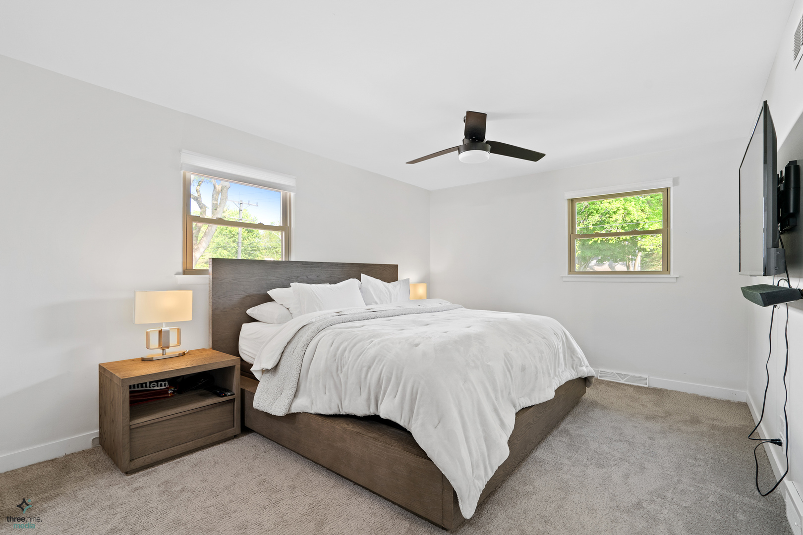 433 West Gartner Road Naperville, IL 60540 - Photo 7 of 29 a bedroom with a bed and a tv