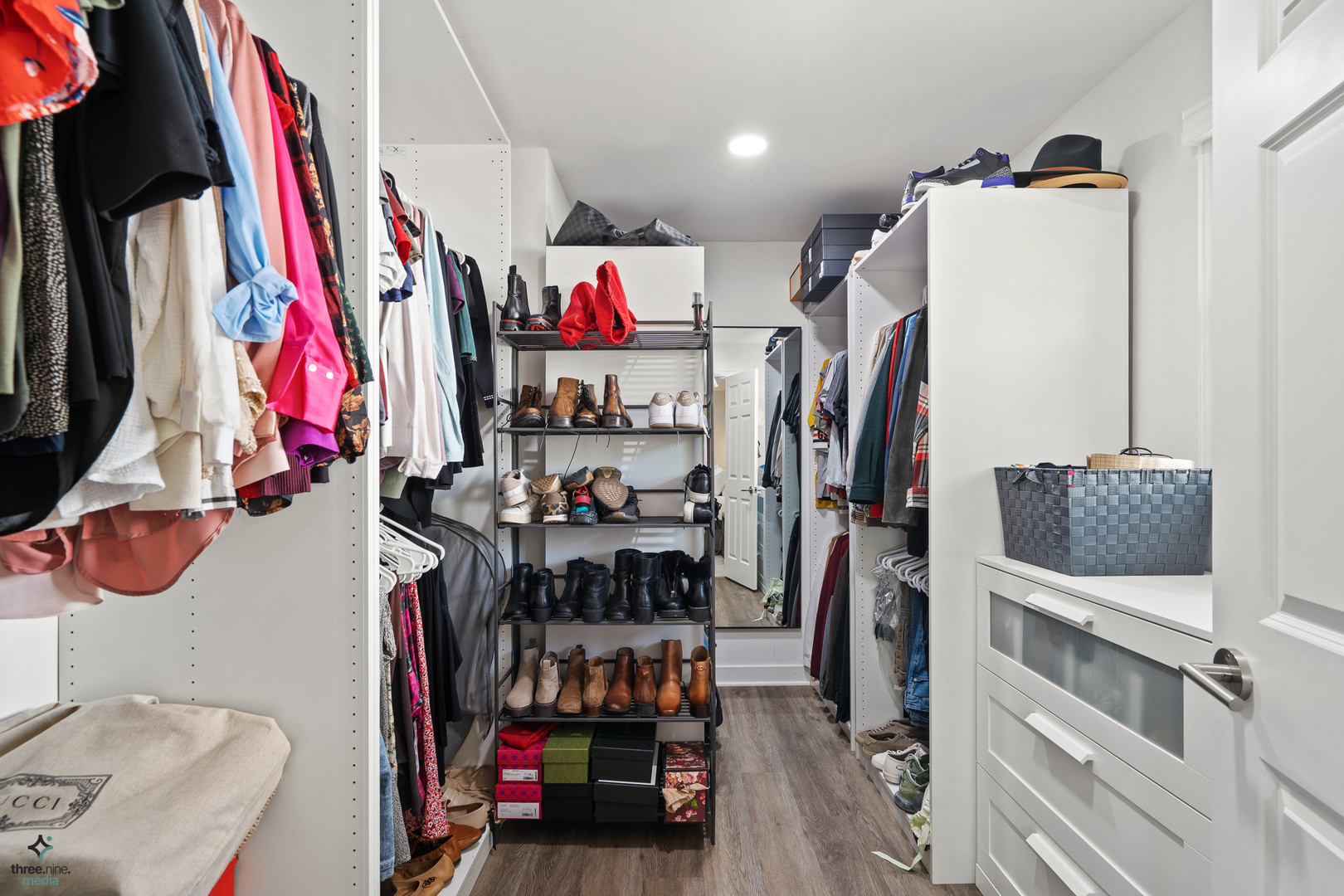 433 West Gartner Road Naperville, IL 60540 - Photo 9 of 29 a view of walk in closet with clothes and shoes