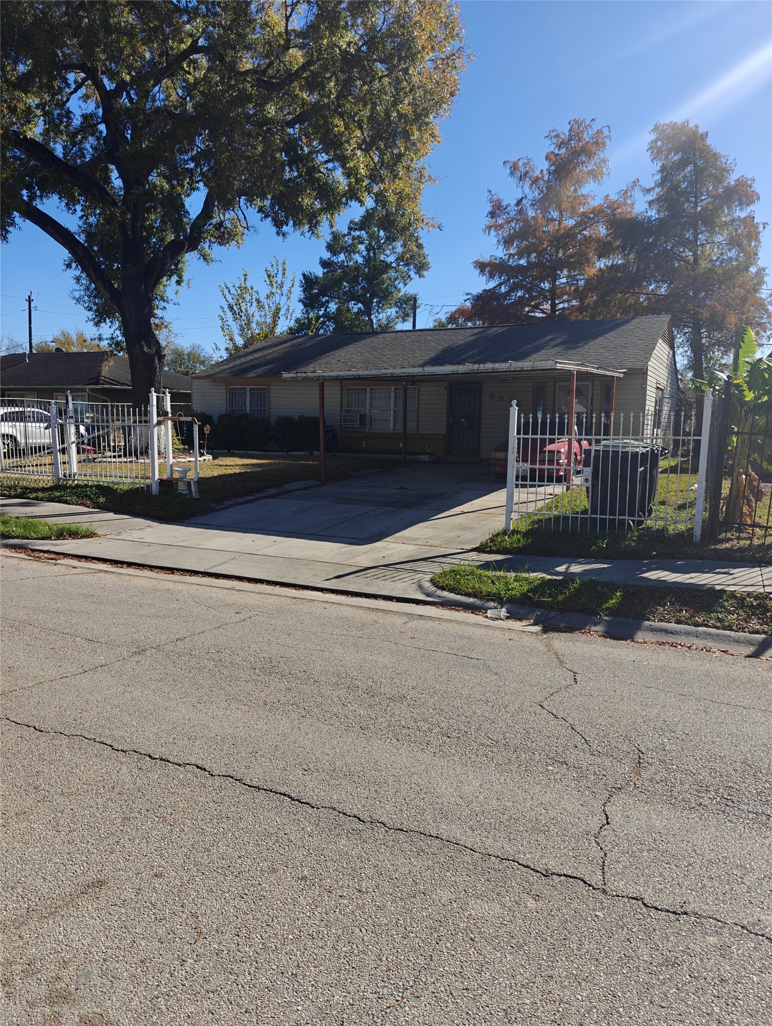 a house with a tree in front of it