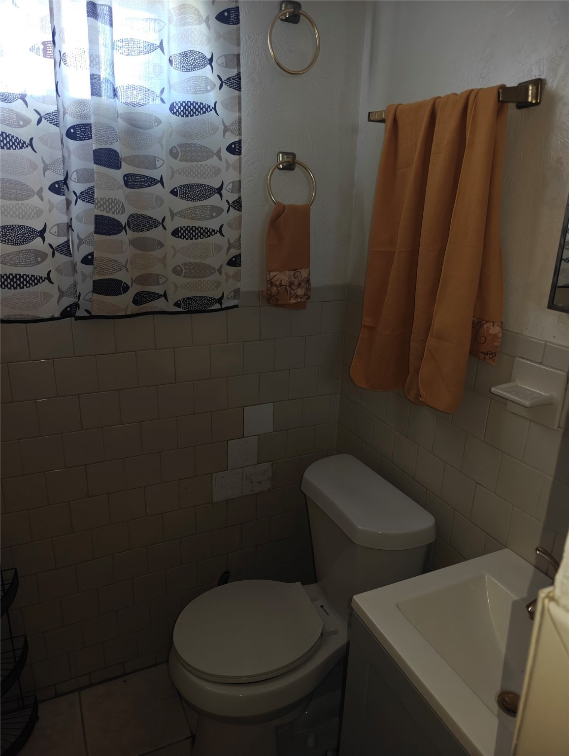 5874 Westover Street Houston, TX 77033 - Photo 5 of 7 a bathroom with a toilet and a shower