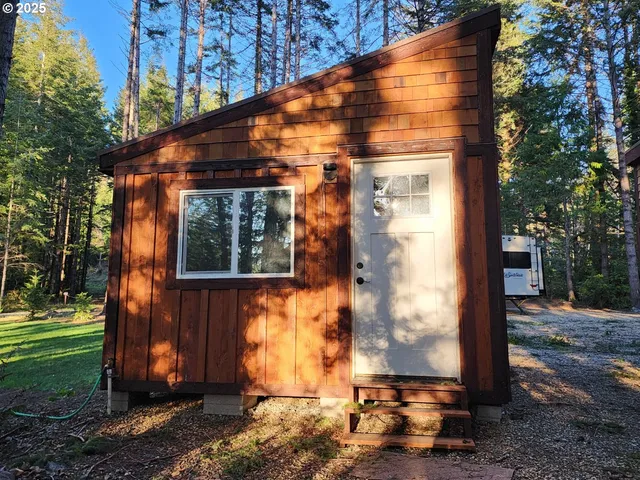 a front view of house with a yard