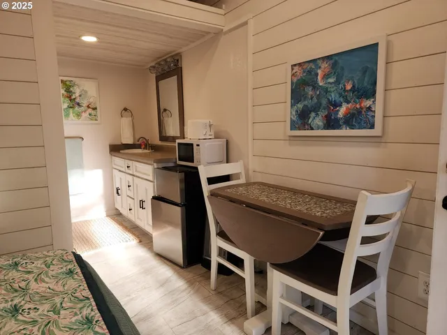 a kitchen with a stove and cabinets