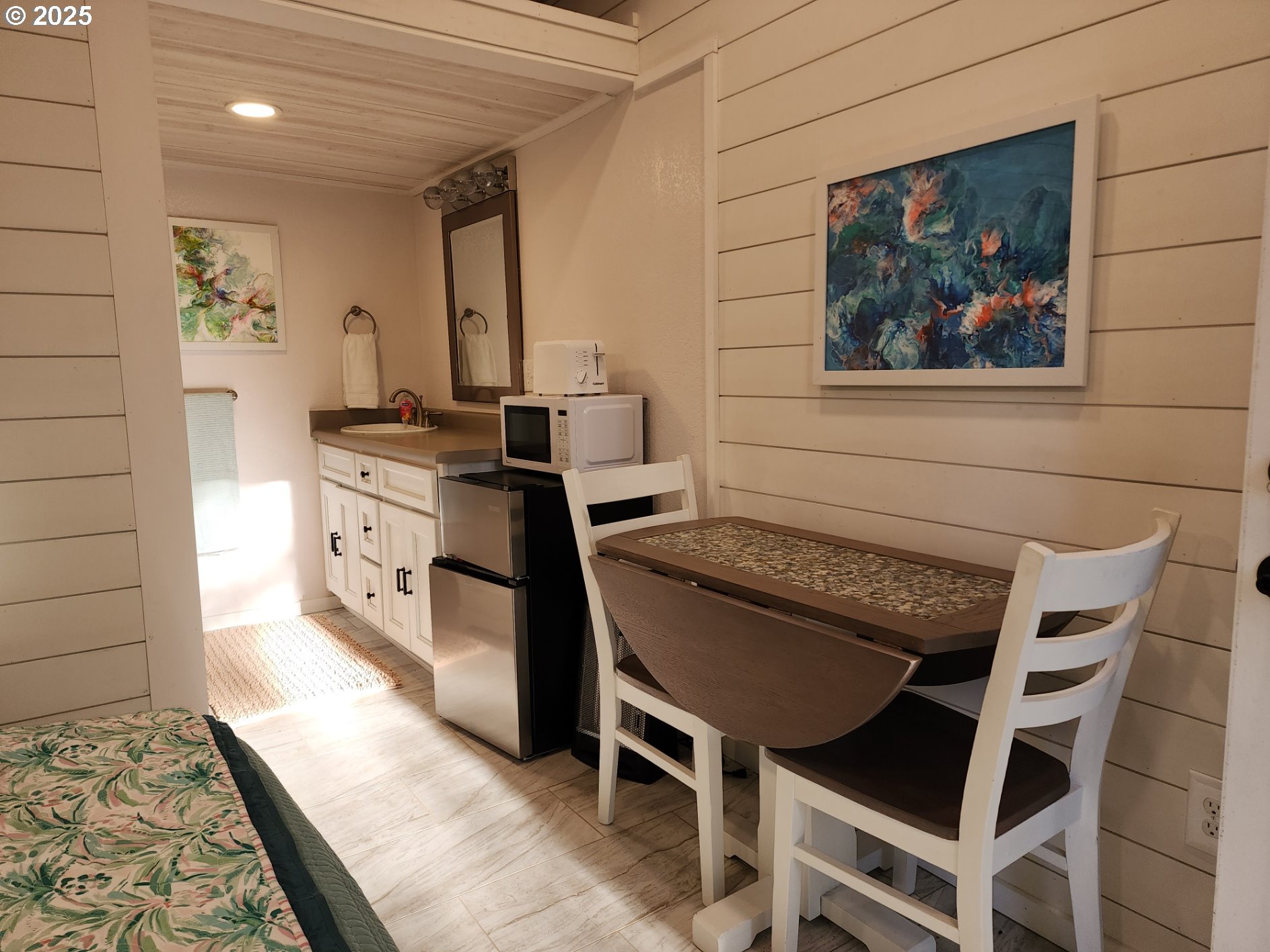 Orchard Road, Unit 3 Port Orford, OR 97465 - Photo 20 of 32 a kitchen with a stove and cabinets