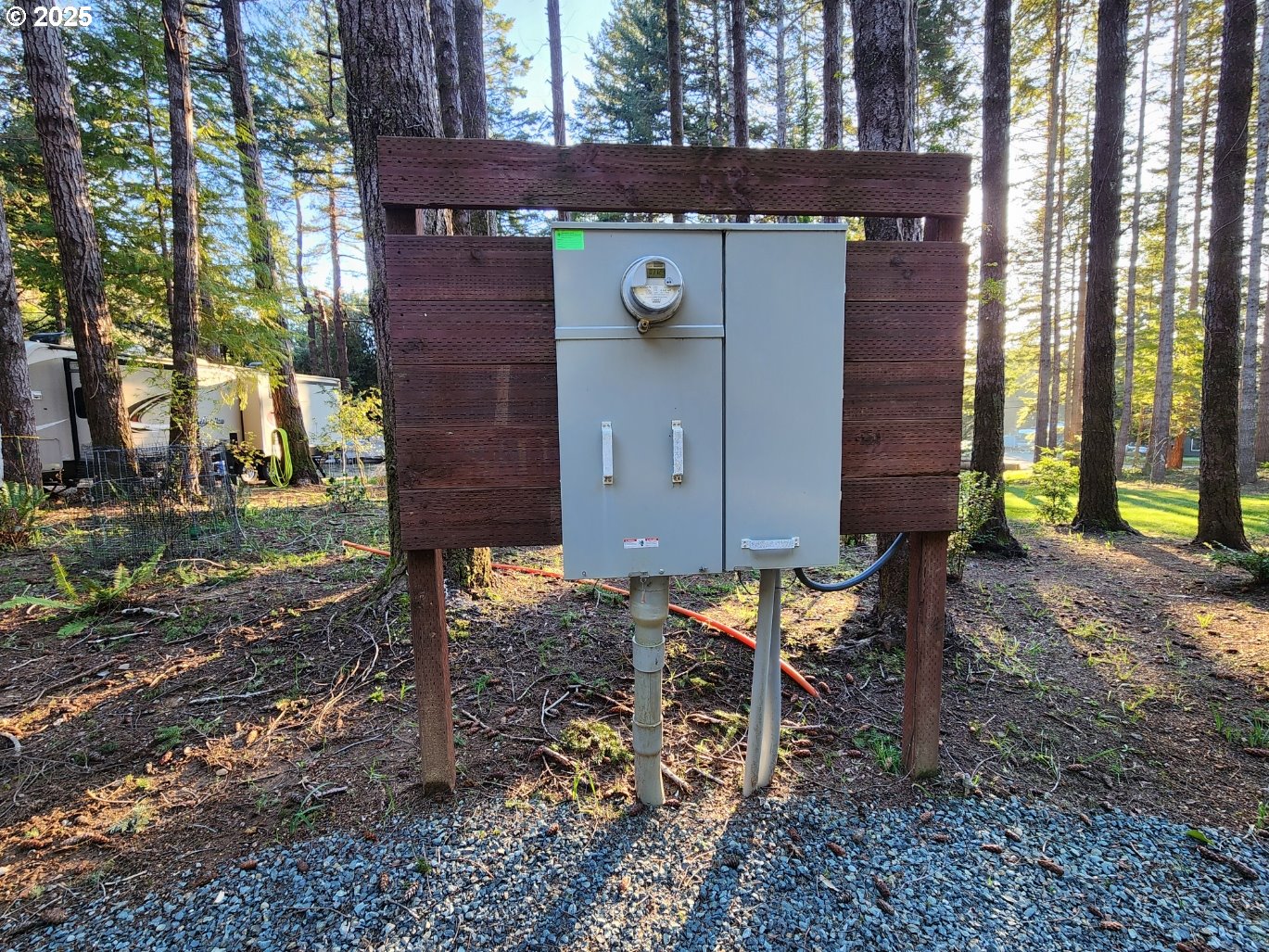 Orchard Road, Unit 3 Port Orford, OR 97465 - Photo 31 of 32 a view of a house with a yard and sitting area