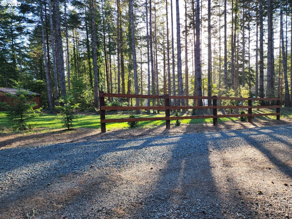 Orchard Road, Unit 3 Port Orford, OR 97465 - Photo 5 of 32 a view of a park with large trees