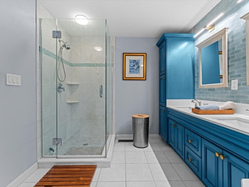29 Deer Path, Unit 29 Hudson, MA 01749 - Photo 26 of 42 a bathroom with a sink a toilet and shower
