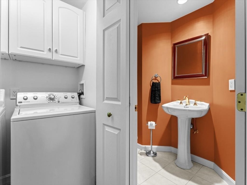 29 Deer Path, Unit 29 Hudson, MA 01749 - Photo 28 of 42 a utility room with dryer and washer