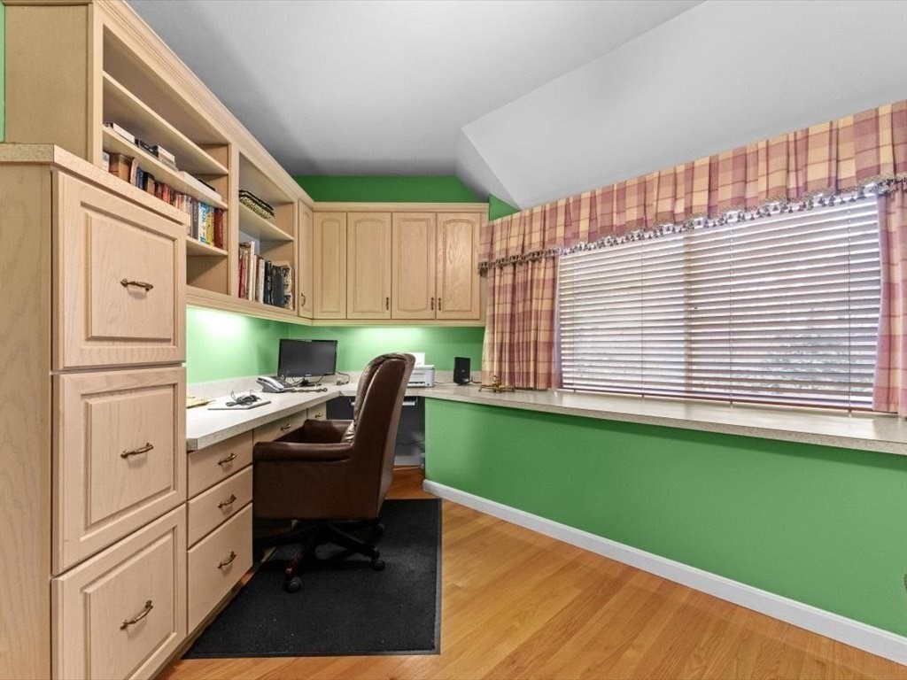 29 Deer Path, Unit 29 Hudson, MA 01749 - Photo 32 of 42 a kitchen with a refrigerator and a cabinets