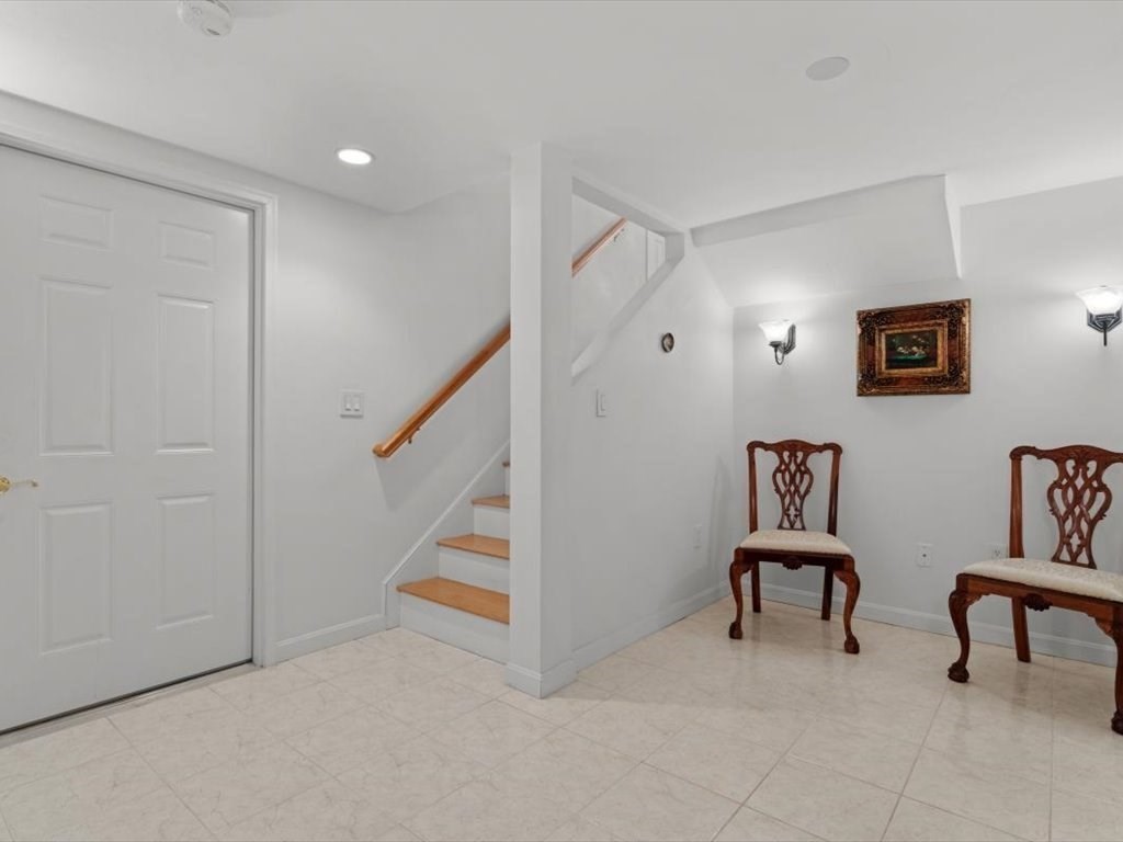 29 Deer Path, Unit 29 Hudson, MA 01749 - Photo 34 of 42 a view of a livingroom with furniture and stairs