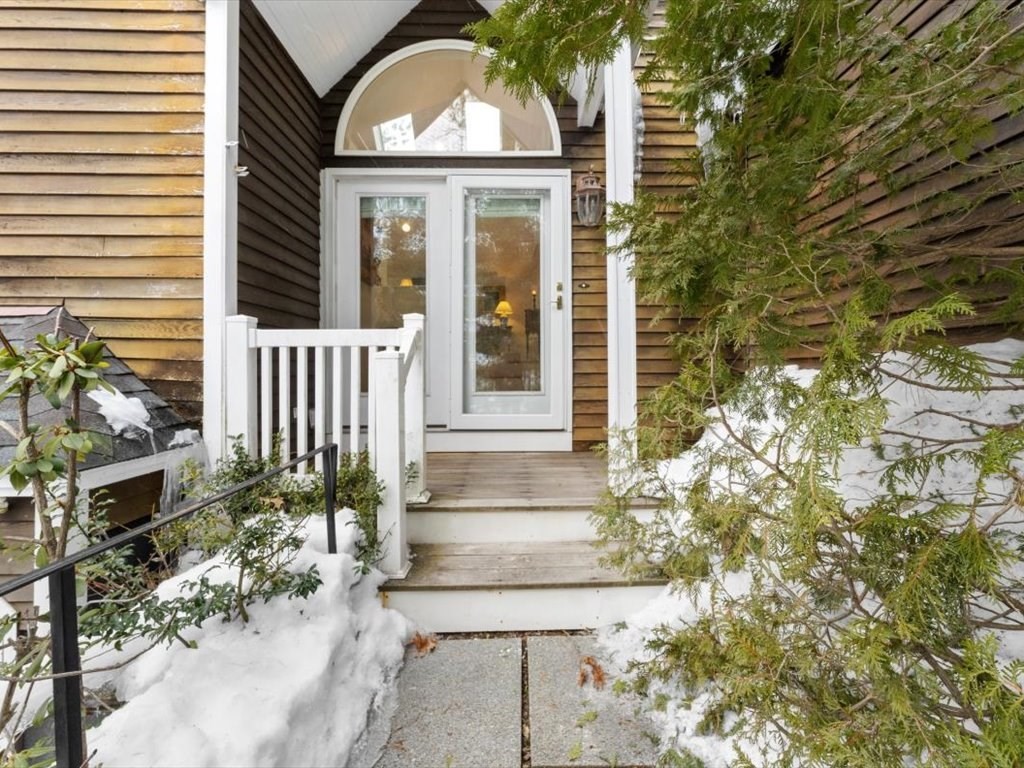 29 Deer Path, Unit 29 Hudson, MA 01749 - Photo 4 of 42 a front view of a house with a porch