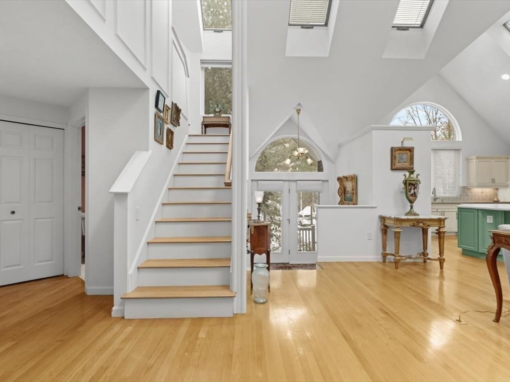 29 Deer Path, Unit 29 Hudson, MA 01749 - Photo 4 of 42 a view of entryway and hall with wooden floor