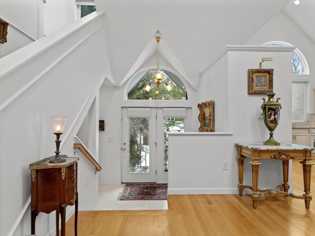 29 Deer Path, Unit 29 Hudson, MA 01749 - Photo 5 of 42 a view of hall way with furniture and window