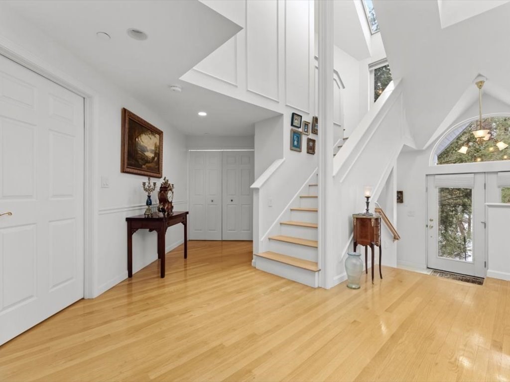 29 Deer Path, Unit 29 Hudson, MA 01749 - Photo 7 of 42 a view of entryway and hall with wooden floor