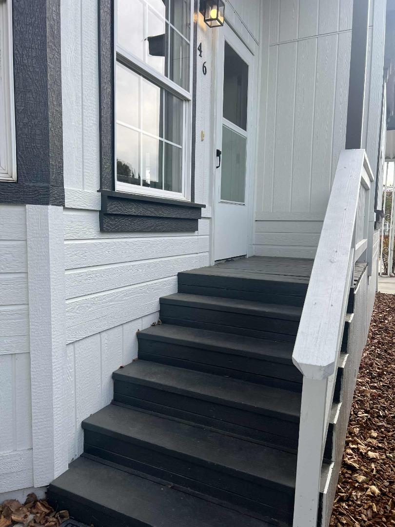 2151 Oakland Rd Space, Unit 46 San Jose, CA 95131 - Photo 3 of 13 a view of entryway with wooden floor and a front door