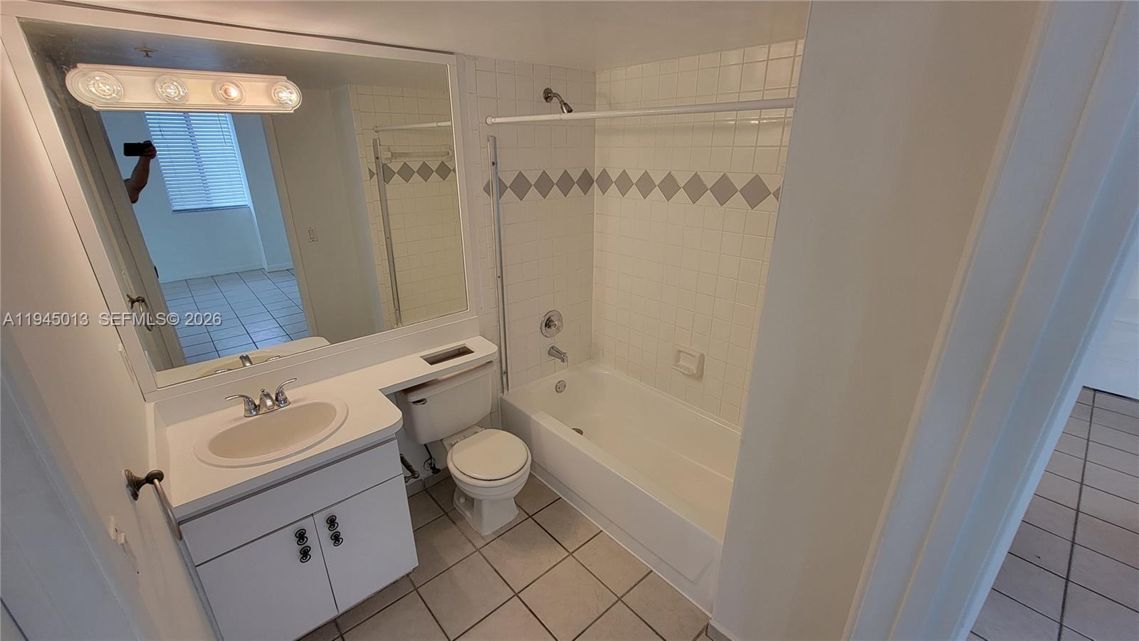 126 Southwest 17th Road, Unit 507 Miami, FL 33129 - Photo 13 of 13 a bathroom with a sink a toilet and shower