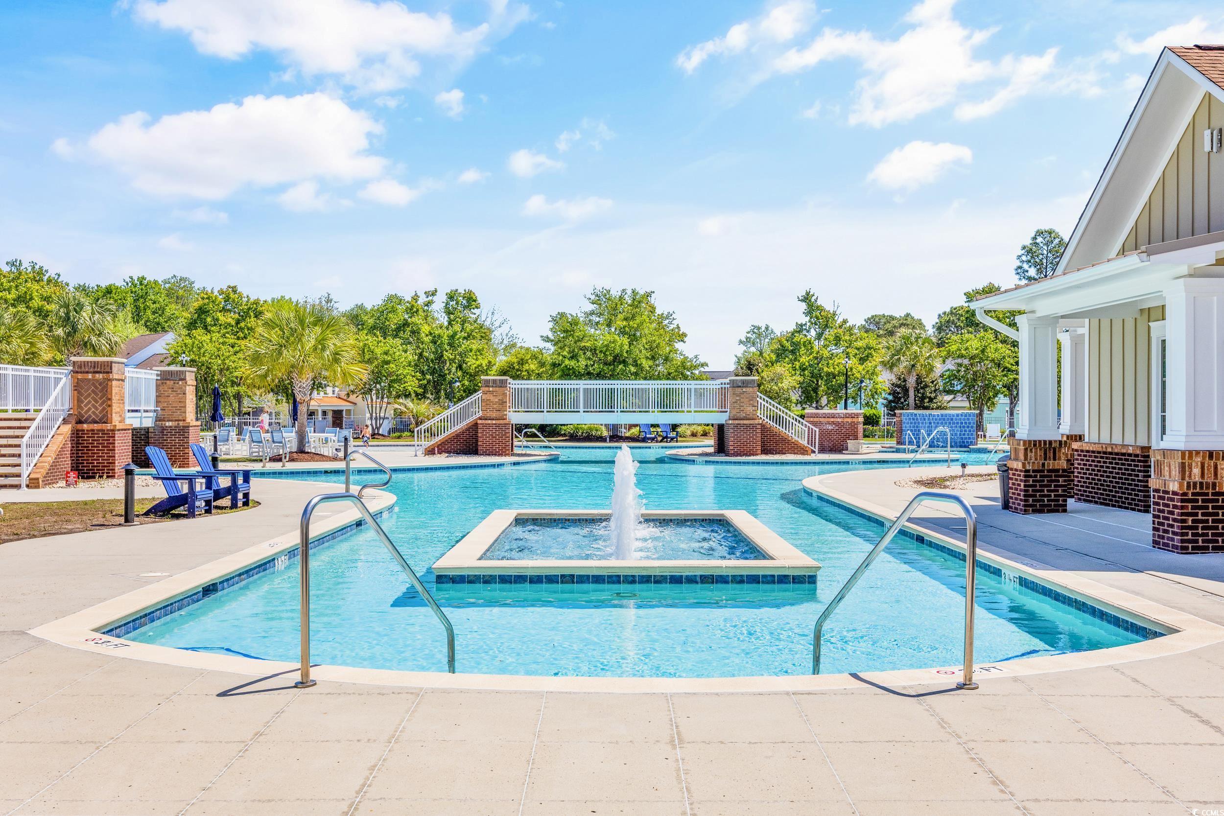 2908 Moss Bridge Lane Myrtle Beach, SC 29579 - Photo 23 of 35 Community pool with a patio area and stairs