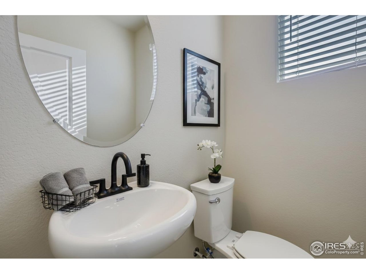2297 East Suniga Road Fort Collins, CO 80524 - Photo 11 of 27 Main level powder room