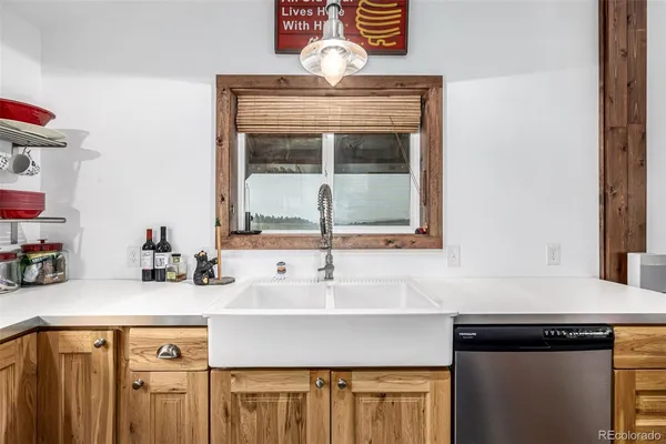 a kitchen with a sink and a cabinets
